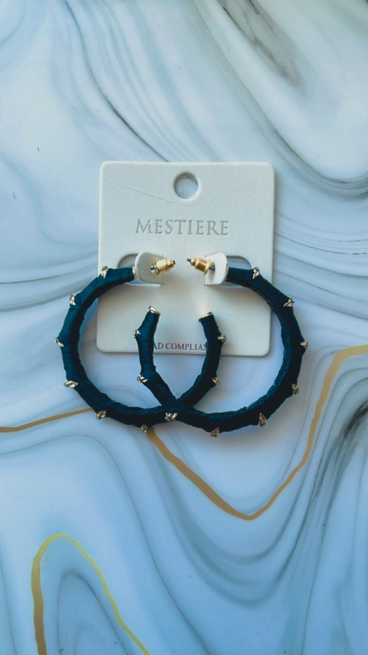 “Just enough” black hoop earrings